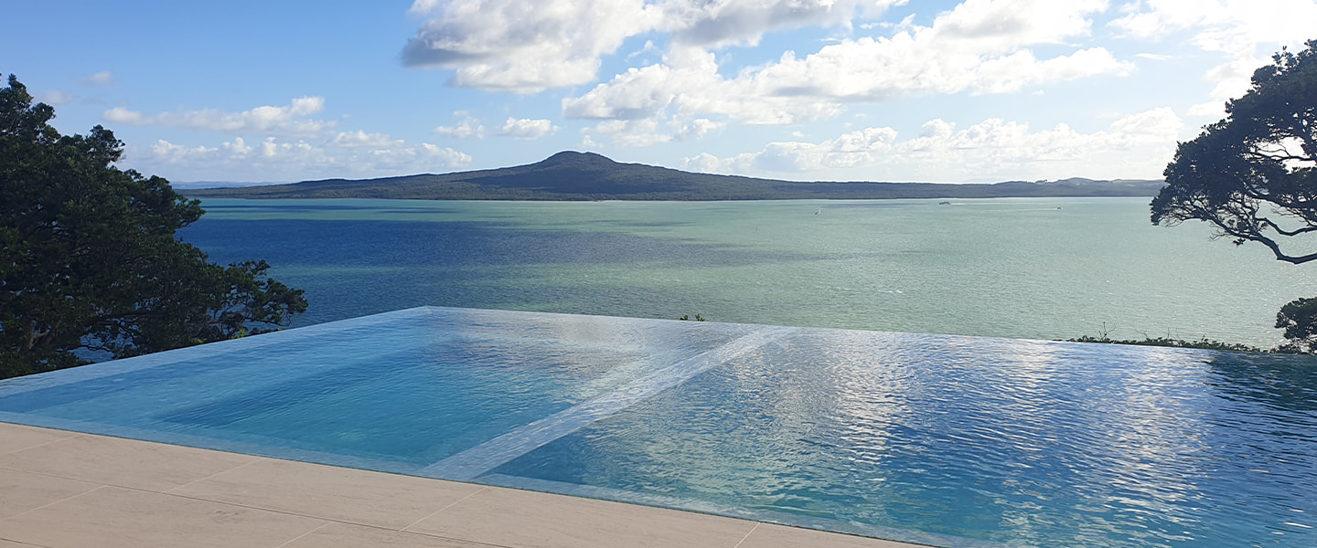 Infinity Edge Pool facing Rangitoto 